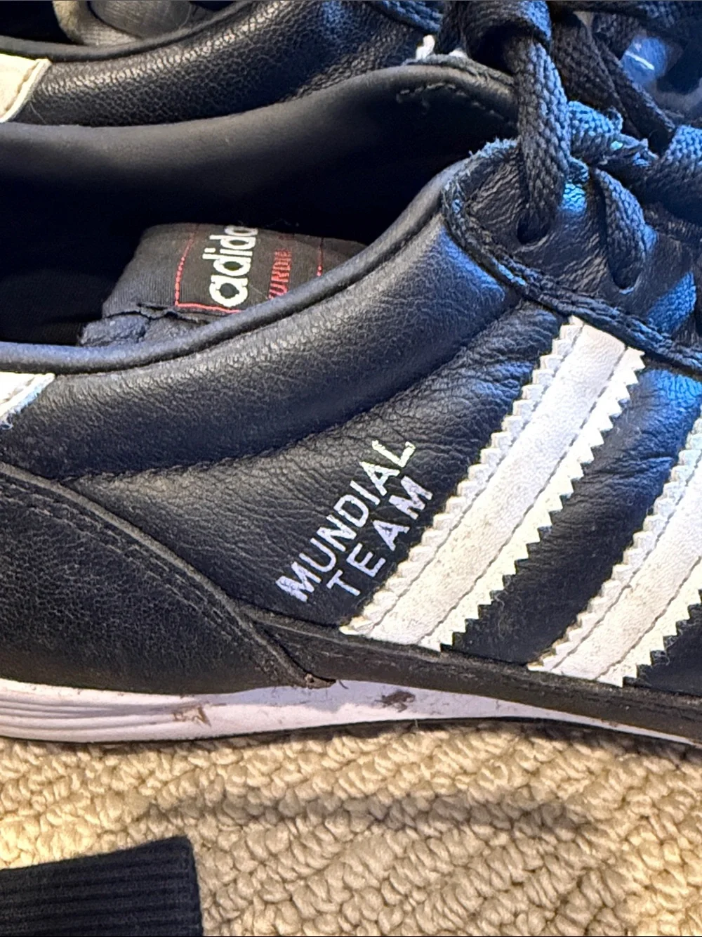 adidas Black turf shoes with White Three Stripes